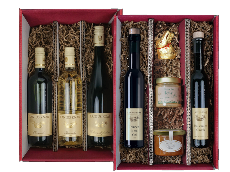 roter Geschenkkarton - 2 Ebenen - gefüllt mit Flaschen und Gläsern